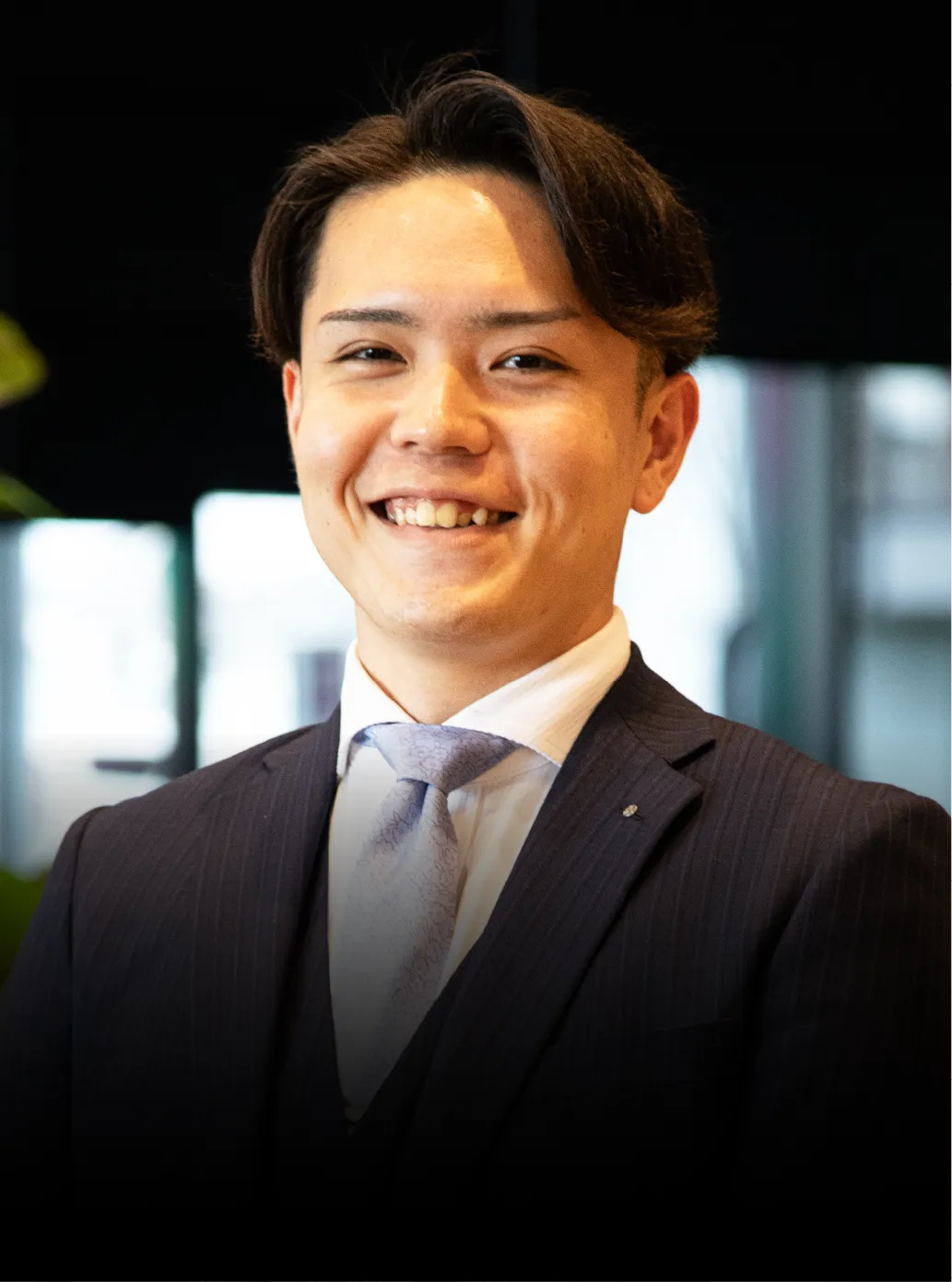 営業として働くT.Kの写真